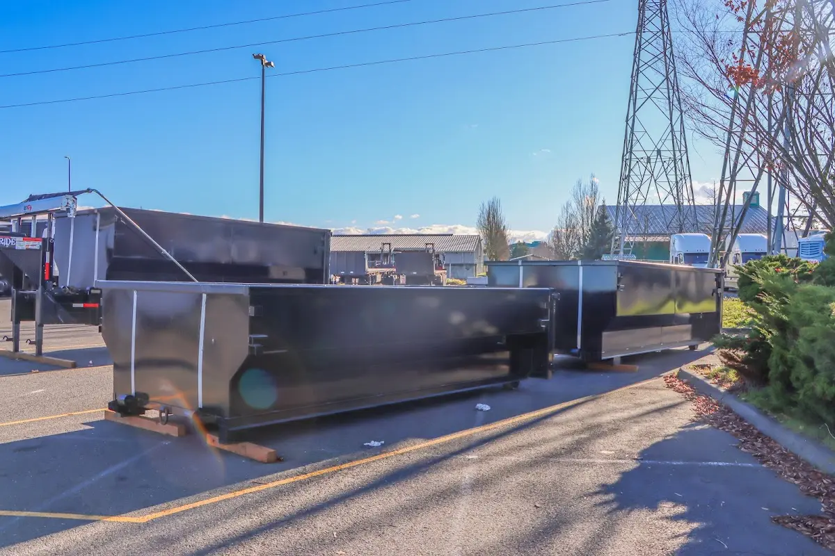 Roll-off dumpster ready for waste disposal at job site for Commercial Dumpster Rental in Crowley